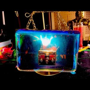 Aura Vibez compact purse with gold chain strap